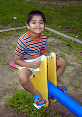 Image showing Enjoying Seesaw