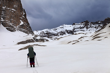 Image showing Two hikers at snowy mountains in bad weather