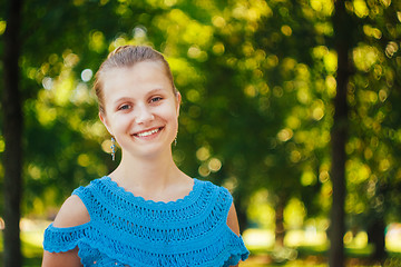 Image showing Closeup Portrait Of Girl In Blue Knitted Dress