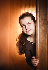 Image showing Girl Opening Door