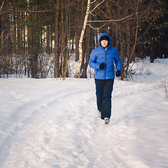 Image showing Handsome Man In Winter Forest