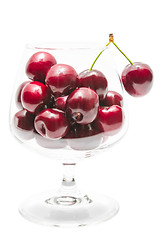 Image showing Ripe cherry big berries in wineglass