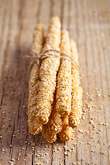 Image showing bread sticks grissini with sesame seeds