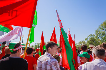 Image showing The youth from patriotic party BRSM holds flags on the celebrati
