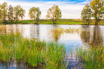 Image showing Landscape With River And Blue Sky