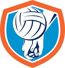 Image showing Hand Hitting Volleyball Ball Shield Retro