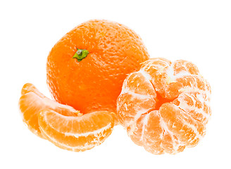 Image showing Peeled mandarin tangerine orange fruit isolated on white backgro