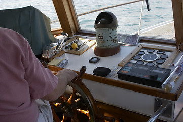 Image showing Steering the Boat