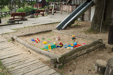 Image showing sandbox full toy on children park in summer time 