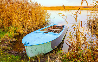 Image showing River and blue rowing boat