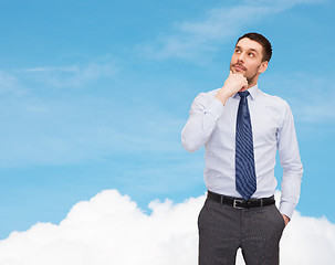 Image showing handsome businessman looking up