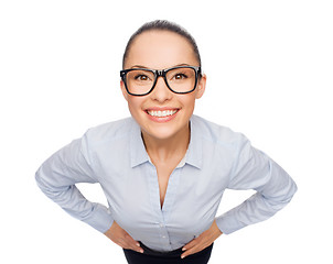 Image showing smiling businesswoman in eyeglasses