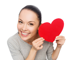 Image showing smiling asian woman with red heart