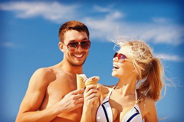 Image showing happy couple with ice cream