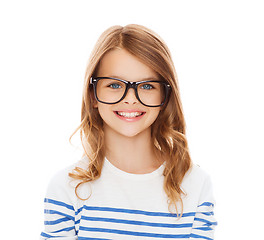 Image showing smiling cute little girl with black eyeglasses