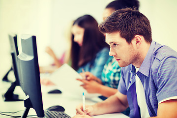 Image showing student with computer studying at school