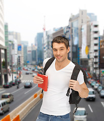 Image showing travelling student with backpack and book