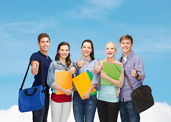 Image showing group of smiling students showing thumbs up