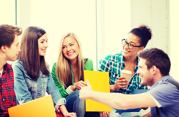 Image showing students communicating and laughing at school