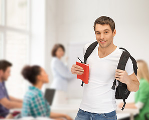 Image showing travelling student with backpack and book