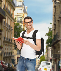 Image showing travelling student with backpack and book