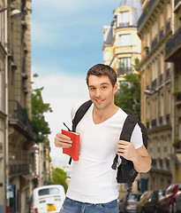 Image showing travelling student with backpack and book