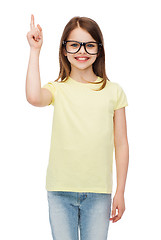 Image showing smiling cute little girl in black eyeglasses
