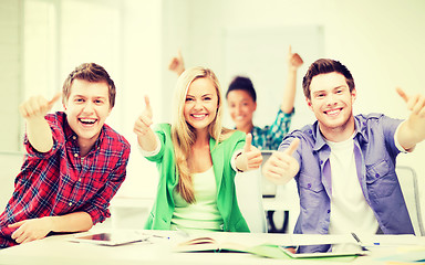 Image showing students showing thumbs up at school