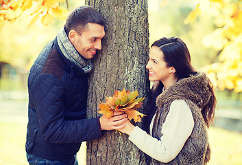 Image showing romantic couple playing in the autumn park