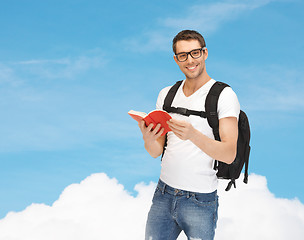 Image showing travelling student with backpack and book