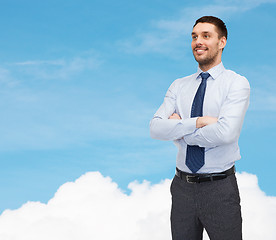 Image showing handsome businessman with crossed arms