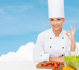 Image showing female chef with vegetables showing ok sign