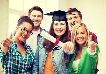 Image showing girl in graduation cap with certificate