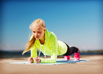 Image showing woman doing sports outdoors