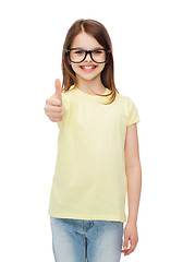 Image showing smiling cute little girl in black eyeglasses