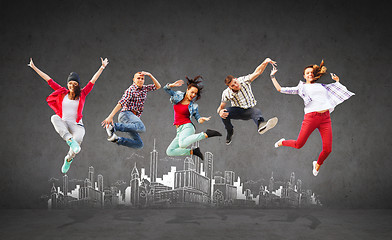 Image showing group of teenagers jumping