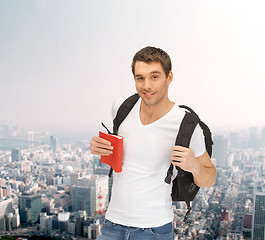 Image showing travelling student with backpack and book