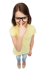 Image showing smiling cute little girl in black eyeglasses