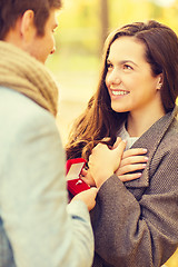 Image showing man proposing to a woman in the autumn park