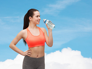 Image showing sporty woman with water bottle