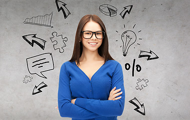 Image showing smiling businesswoman or student in glasses