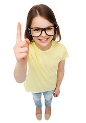 Image showing smiling cute little girl in black eyeglasses