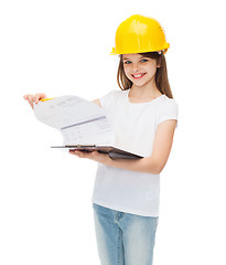 Image showing smiling little girl in protective helmet