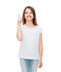 Image showing smiling little girl in white blank t-shirt