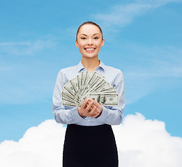 Image showing young businesswoman with dollar cash money