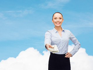 Image showing young businesswoman with dollar cash money