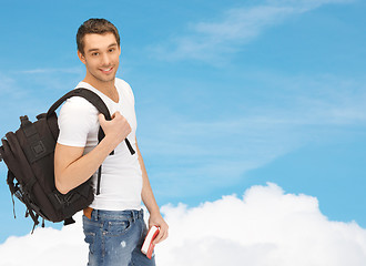 Image showing travelling student with backpack and book