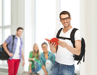 Image showing travelling student with backpack and book