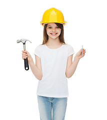 Image showing smiling little girl in protective helmet