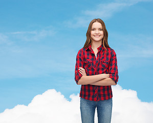 Image showing smiling young woman in casual clothes